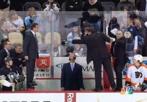 Predators Coach Peter Laviolette goes after the Penguins bench in a late season game in 2012